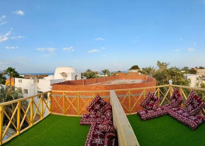 Cozy Rooftop بيت للعطل دهب